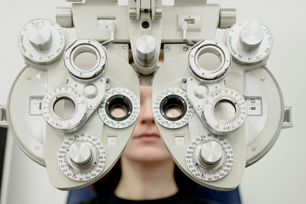 Person taking an eye test and paying for the appointment with a Health Savings Account in Reno, Nevada