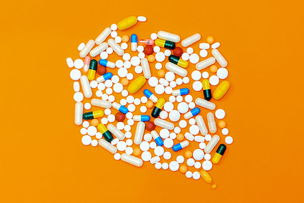 Pile of prescription medication as part of Medicare prescription price negotiations